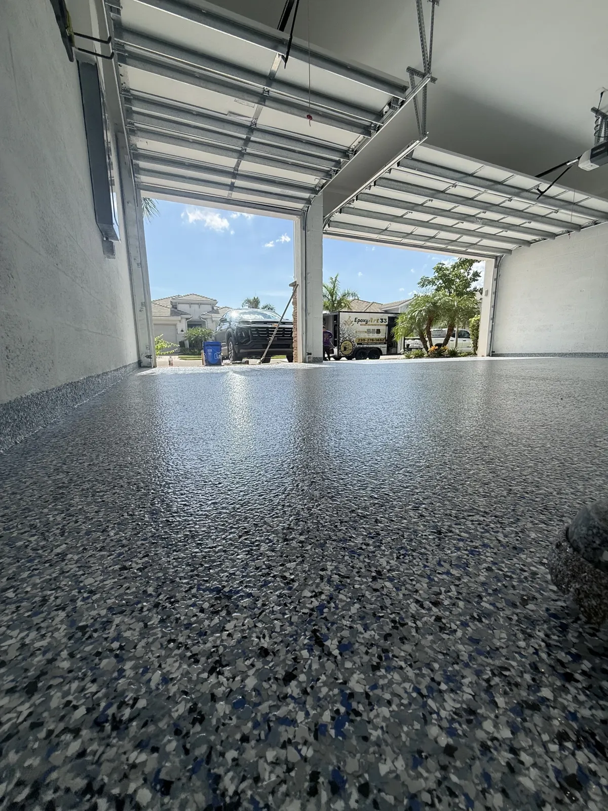 After — Seamless finish toward the open garage bay