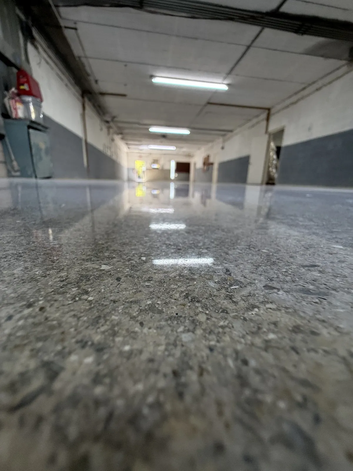 After — Corridor gloss and exposed aggregate detail