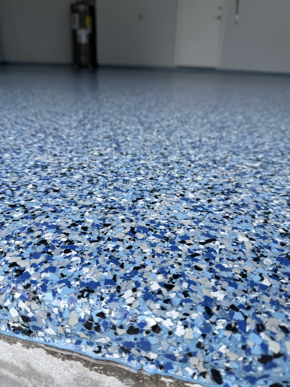 Tropical Breeze Flake Blend Detail - Polyaspartic Garage Floor