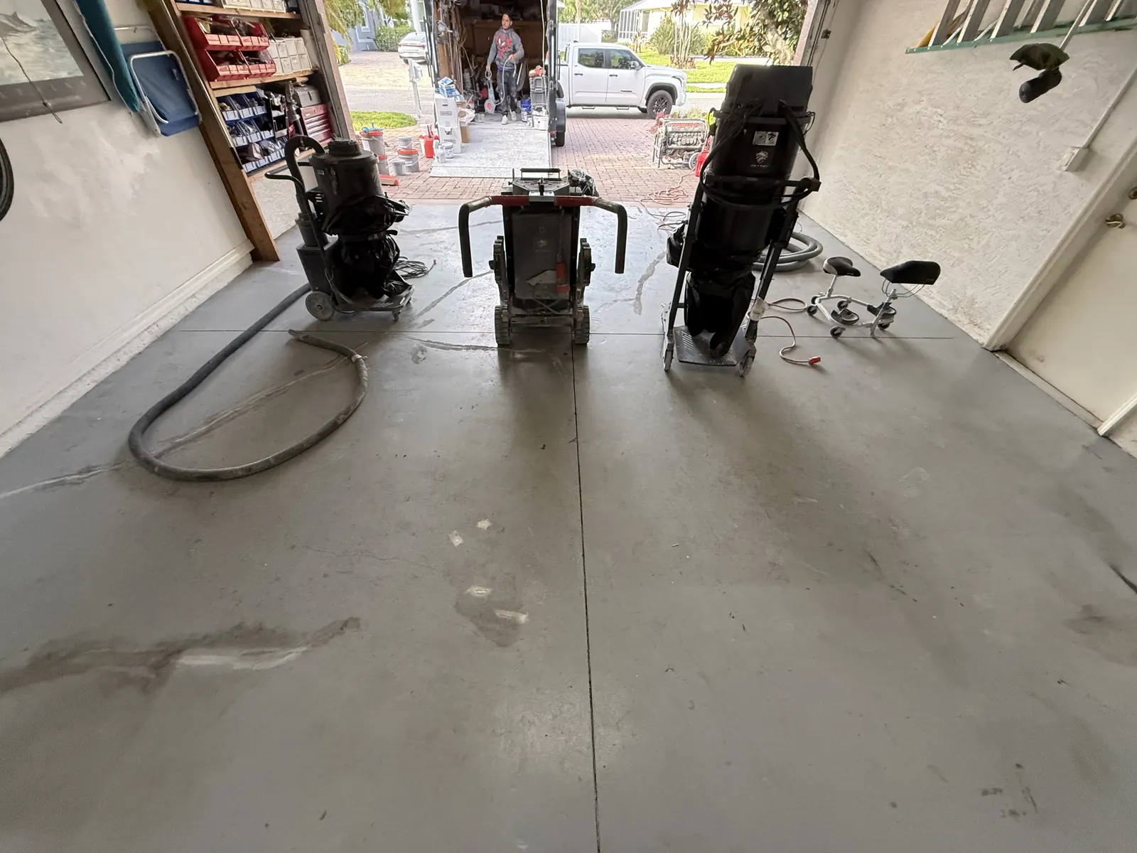 Garage Partial Flake BEFORE - Diamond Grinding Naples FL