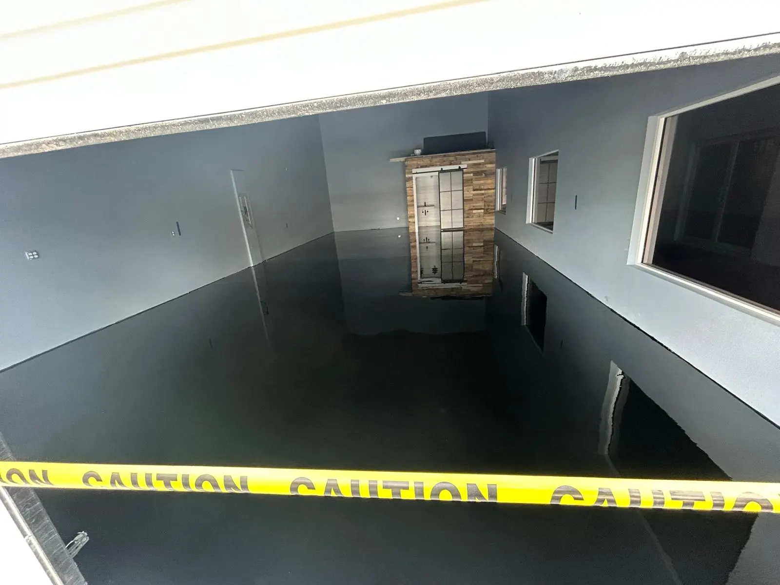 Solid color epoxy garage floor Marco Island FL - clean uniform finish