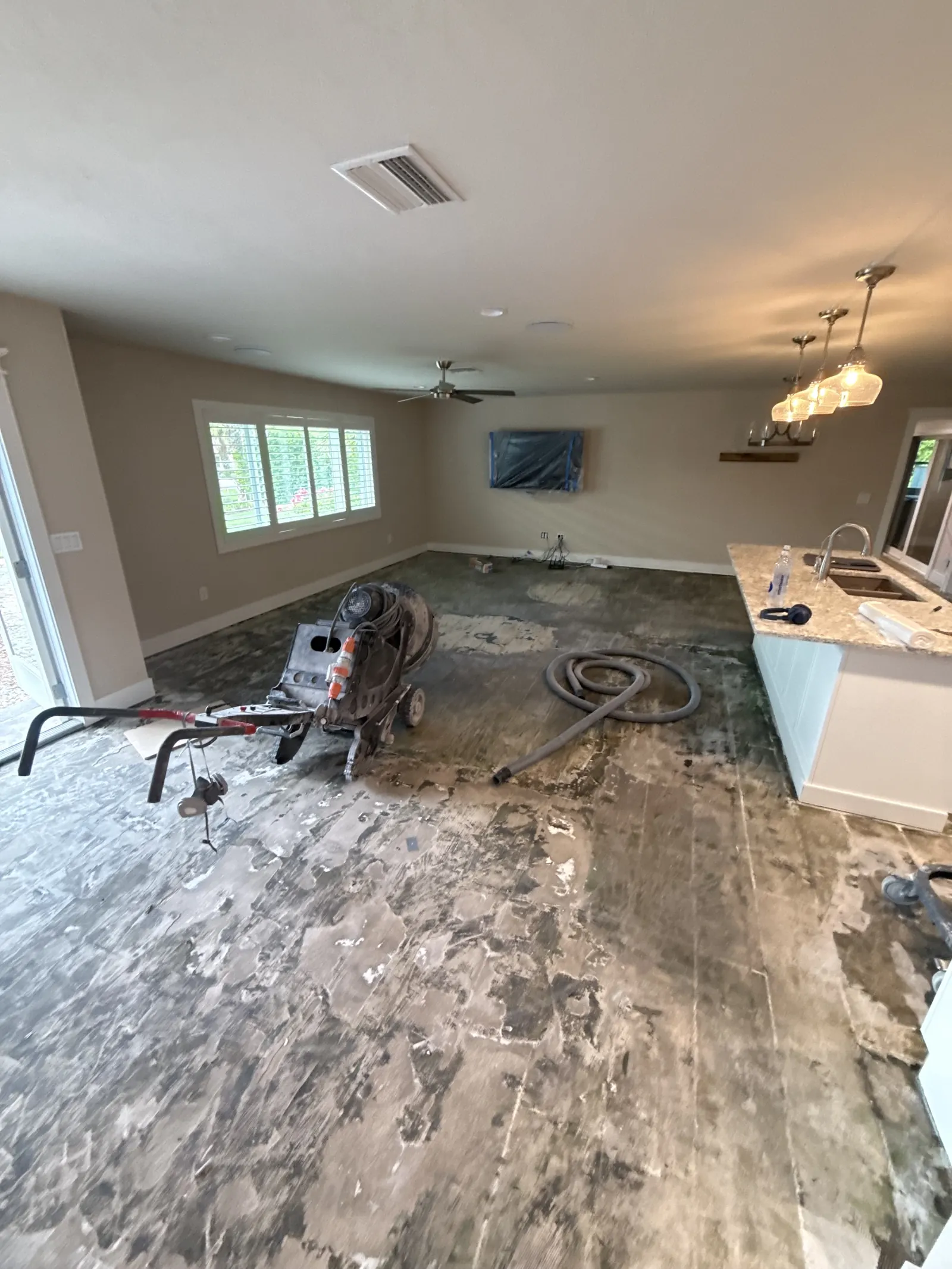White Metallic Epoxy BEFORE - Naples FL Residence